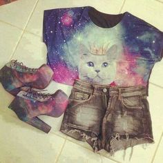 a pair of shorts and t - shirt with an image of a cat on it