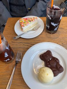 two plates with desserts and drinks on a table