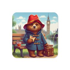 a brown bear wearing a red hat and blue coat standing in front of a bench