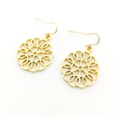 Expertly crafted with brushed gold pendants and 14k gold-filled hooks, the Julianna earrings add an elegant touch to any outfit. The 1" circular pattern of the pendants adds a unique and sophisticated flair. Plus, the nickel-free design ensures comfortable wear for all-day use. Gold Pendants, Cut Clothes, Beanie Style, Circular Pattern, Earring Patterns, Circle Pattern, Accessories Rings, Earrings Gold, Gold Pendant