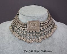 Old highgrade silver choker necklace with leaf-dangles.  The jewelry part is 25 cm / 9,8 " wide and consits of 3 strands connected by jewelry pieces. The central jewelry piece and the two side ones show motifs of birds and trees (the tree of life). Those motifs are very old and can be traced back to pre-islamic times.Origin: Kaschmir / North-India / North PakistanSilver quality: 900This choker is newly restrung. Hight 6 cm / 2,36 "Weight132 g Birds And Trees, Silver Choker Necklace, North India, Bird Motif, Traditional Bride, The Tree Of Life, Silver Choker, Bride Jewellery, Multi Strand Necklace