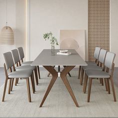 a dining table with six chairs around it