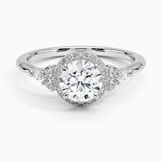 a white gold engagement ring with diamonds