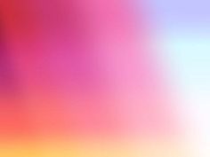 an abstract blurry background in pink and blue