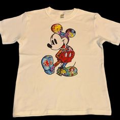 Soft 100% Cotton Tshirt With A Wonderful Mickey Design Filled With So Many Wonderful Characters. The Perfect Top For Any Disney Fan. . A Bright Colorful Design Great For Your Next Adventure. Playful Unisex T-shirt With Character Print, Multicolor Fun T-shirt With Character Print, Fun Multicolor Character Print T-shirt, Multicolor Character Print Fun T-shirt, Fun Multicolor Pre-shrunk T-shirt, Multicolor Playful T-shirt With Funny Print, Fun Character Print T-shirt, Summer Multicolor Character Print T-shirt, Multicolor Graphic Tee With Character Print