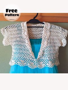 a crochet top hanging on a wall with the words free pattern below it