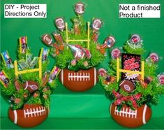 two football vases filled with candy and candies