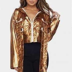 Edgy And Fun This Gold Metallic Jacket Will Be Your Fav!! Jacket Features: -Long Sleeves -Flap Front Pockets With Buckle Closure Detailing, -Metallic Finish -Contrast Zip-Up Closure, -Semi Cropped Length, -Hooded -Material Polyester Model Is 5’8 Wearing A Size Small (Waist: 24”, Bust: 32b, Hips: 34”) True To Size S=4/6 M=8/10 L=10/12 Fit: Loose As Seen On Model Hooded Fall Party Outerwear, Metallic Outerwear For Party, Casual Metallic Outerwear For Party, Chic Gold Long Sleeve Outerwear, Trendy Hooded Outerwear For Party, Trendy Gold Outerwear For Party, Trendy Gold Party Outerwear, Trendy Metallic Outerwear For Fall, Chic Gold Outerwear For Spring