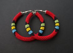 Handmade Red Beaded Hoop Earrings, Adjustable Red Hoop Earrings, Red Colorful Beads Hoop Earrings, Traditional Handmade Hoop Beaded Earrings, Traditional Handmade Red Hoop Earrings, Bohemian Red Hoop Earrings With Colorful Beads, Red Beaded Round Hoop Earrings, Traditional Red Round Hoop Earrings, Traditional Red Hoop Earrings As Gift