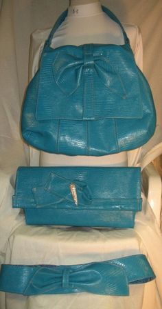 Turquoise Envelope/Clutch Handbag Elegant Turquoise Bag For Formal Occasions, Elegant Turquoise Shoulder Bag For Shopping, Elegant Turquoise Bag With Removable Pouch, Elegant Turquoise Leather Bag, Elegant Turquoise Tote Shoulder Bag, Turquoise Rectangular Evening Shoulder Bag, Turquoise Rectangular Shoulder Bag For Evening, Elegant Sophisticated, Stamp Printing