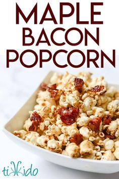 a white bowl filled with bacon popcorn on top of a table