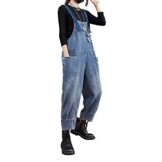 Introducing the 2023 Spring-Summer Collection ââ‚?Street Style Women's Denim Jumpsuit. the perfect blend of laid-back style and conventional sophistication! Take your look to the next level with this unique piece. crafted to embody the essence of rebellion and quintessential vogue.Why They're Your Next Statement PieceFeaturing a slouchy fit with suspenders closure. these denim jumpsuits offer a medium wash and edgy distressed pattern that's sure to make a statement. Not just a jumpsuit. but an a Blue Baggy Straight Leg Overalls, Baggy Blue Straight Leg Overalls, Washed Blue Denim Jumpsuit With Pockets, Wide Leg Denim Jumpsuit With Pockets, Non-stretch High Waist Dark Wash Denim Jumpsuit, Blue Denim Overall Jumpsuit With Pockets, Washed Blue Relaxed Fit Jumpsuits With Pockets, Baggy High-waist Denim Jumpsuit For Summer, Blue Washed Relaxed Fit Overalls