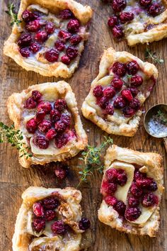 cranberry tarts on a cutting board with a spoon