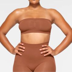 Bronze Large Nwt Seamless Stretch Tube Top Shapewear, Seamless Stretch Tube Top For Shapewear, Seamless Stretch Shapewear Tube Top, Seamless Strapless Tube Top, Strapless Seamless Tube Top With Micro-elastic Fit, Fitted Orange Bandeau Tube Top, Orange Bandeau Tube Top, Fitted Brown Bandeau Tube Top, Strapless Bandeau