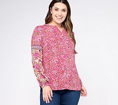 A bright and cheery floral print covers this button-front blouse, making it the perfect pick for weekend outings or hitting up happy hour after a long day at the office. From Belle Boho by Kim Gravel. Casual Long Sleeve Peasant Top With Floral Print, Spring Long Sleeve Blouse With Vibrant Print, Bohemian Long Sleeve Tops With Ditsy Floral Print, Spring Floral Print Peasant Top, Casual Multicolor Floral Print Peasant Top, Casual Patterned Floral Peasant Top, Casual Patterned Floral Print Peasant Top, Casual Patterned Peasant Top With Floral Print, Long Sleeve Floral Print Peasant Top For Spring