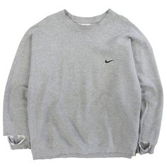 Vintage Nike Crewneck Sweatshirt Size 2XL Gray Embroidered Swoosh 90s Condition/Description Satisfactory condition.  Photos will highlight any imperfections on the item. Please refer to the photos to see the specific condition of the item.  Measurements: Pit to pit - 27" Length - 30" Collar to cuff - 32" Due to the nature of vintage clothing, size in title may not accurately represent the measurement of the item. Please refer to the measurements above to ensure the right fit. CONDITION LEGEND Excellent - Free of marks, stains, holes, or loose stitching. Great - Minor cracking or pilling; items may have minor marks or stains (free of fraying, loose stitching, and holes/rips). Good - May have minor marks/stains, minor yellowing, small holes, loose stitching, or fraying. Satisfactory - May ha Crew Neck Nike Vintage, Nike Vintage Sweatshirt Creme, Nike Sweatshirt Gray, Nike Crew Neck Vintage, Grey Nike Sweatshirt Vintage, Nike Crewneck Sweatshirt, Nike Crewneck, Nike Vintage, Mens Hoodies