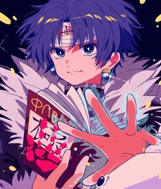 an anime character is holding a book in her hand