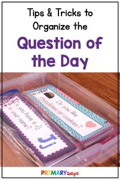 a plastic container filled with books and writing on the cover is labeled tips & tricks to organize the question of the day