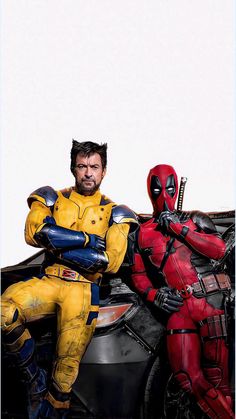 two deadpools are sitting next to each other