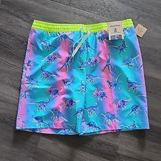 Questions? Leave A Comment Below! Pink Swim Trunks For Sports In Spring, Pink Swim Trunks For Spring Sports, Blue Swim Trunks For Spring Playwear, Casual Blue Swimwear For Play, Blue Sporty Swim Trunks For Playwear, Playful Pink Swim Trunks For Beach Season, Playful Pink Pool Bottoms, Playful Pink Swim Trunks For Swimming, Playful Pink Swim Trunks