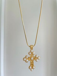 D E T A I L S - 18K Gold Filled and Pearls, Brass - 1mm Smooth Snake Chain  - Cross 36 mm x 25mm  - Chain Length: 16", 18" or 20"  - Lobster Clasp - Synthetic Pearls   P A C K A G I N G Dylan Rae Jewelry is elegantly presented in our premium microfiber jewelry case, ensuring both protection and a polished presentation. If you require separate packaging for multiple items, kindly let us know. C A R E Care for Your Gold Filled Jewelry: Wear It, Love It, Care for It! Our gold-filled pieces are craf Gold Necklaces With Pearl Chain And Cross Pendant, Gold Necklace With Pearl Chain And Cross Pendant, Cross Necklace Simple, Cross Necklace Gold, Dainty Cross Necklace, Gold Cross Necklace, Necklace Pearl, Gold Cross, Necklaces For Women