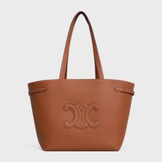 LARGE VOYAGE BAG IN TRIOMPHE CANVAS WITH CELINE PRINT - TAN | CELINE Cuir Triomphe, Celine Tote Bag, Celine Tote, Aging Beautifully, Fragrance Collection, New Fragrances, Dog Accessories, Small Leather Goods, You Bag