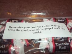 there is a bag of candy with a note on it that says, remember your roll as a missionary is to bring the good news of the gospel to all the world