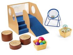 an assortment of toys including a play set and other items for children's play