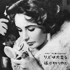 an old black and white photo of a woman brushing her teeth