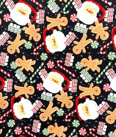 an image of christmas cookies and candy canes with santa clause on black cotton fabric