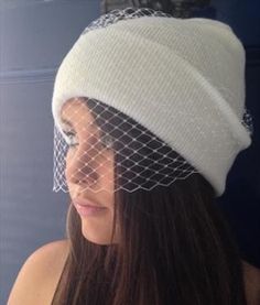 White beanie with veil or black beanie with black veil . This gorgeous custom beanie hat with a birdcage veil is a fabulous modern twist on vintage glamour. The neat edge veiling is secured to the beanie and can be worn pulled down over eyes, whole face or even off face, however your mood takes you as it's fully adjustable! White hat with white veil Black, hat with black veil One size White Cap Mini Hat For Weddings, Elegant Bonnet For Wedding, One Size Fits Most, Elegant Wedding Bonnet One Size Fits Most, Elegant Wedding Bonnet - One Size Fits Most, Elegant Wedding Bonnet, One Size, Winter Wedding Hat Headpiece, White Wedding Hat, One Size Fits Most, White Wedding Hat (one Size Fits Most), Winter Wedding Cloche Mini Hat