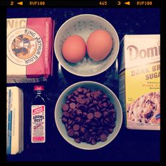 eggs, milk, chocolate chips and other ingredients on a table