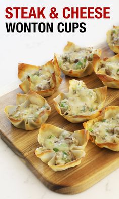 steak and cheese wontons on a cutting board with text overlay that says steak and cheese wontons