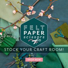 scissors are sitting on top of fabric with flowers and branches in the background text reads felt paper scissors stock your craft room shop now