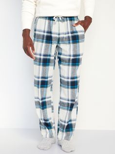 Elasticized waistband, with adjustable drawstring.  Faux fly.  Diagonal hip pockets.  Cozy cotton flannel.  Easy pull-on style.  All-over prints match back to the fam! Sits at waist.  Relaxed hip and thigh.  Straight leg.  Regular inseam: 31".  Tall inseam: 33".  Model is approx.  6'1" and wears a size M (32W). Flannel Pajama Pants, Flannel Pajamas, Red Tartan, The Fam, Pants For Men, Blue Gingham, Mens Pajamas, Drawstring Waistband, Cotton Flannel