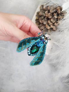 "Beautiful beetle brooch (cicada brooch) is lovely handmade by me. 💓 This beautiful hand embroidered beetle brooch (cicada brooch) took hours of precision and elaborate embroidery work. This cicada brooch will be a wonderful gift to a very special person! SIZE Brooch size ~ 2.16\" * 2.75\" (5.5 * 7 cm) MATERIALS Made of czech, japanese seed beads, glass crystals and sequins. Beaded jewelry requires careful and loving care. Avoid contact with hairspray, perfume, water, bleaches & lotions. Av Handmade Pendant Brooches, Unique Handmade Pendant Brooch, Unique Handmade Wedding Pins, Unique Handmade Blue Brooches, Unique Beaded Brooches For Crafting, Unique Handmade Green Brooches, Handmade Unique Brooches For Crafting, Unique Green Brooches As Gifts, Green Pendant Brooch For Gift