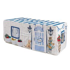 a blue and white striped storage bag with pictures on the front, featuring an image of a dog