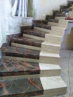 marble steps are lined up against the wall