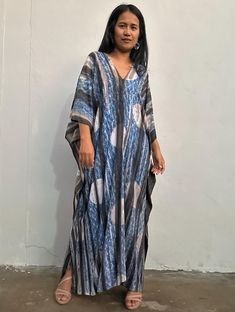 MEASUREMENTS:  * One Size Fits  * Best for US size: Large to 2XL * Arms      22 inches round * Bust / Waist / Hips Circumference 64 inches * V-Neck      * Length    52  inches  * Material   100% Rayon, Natural Indigo dye M O D E L: * Size US 4  * Height 5 feet 4 inches or 163 cm. With 4 inch High Heel. Casual Flowy Tie-dye Kaftan, Tie-dye Free Size Kaftan For Beach Cover-up, Flowy Tie Dye Kaftan Tunic, Flowy Tie-dye Tunic Kaftan, Tie Dye Flowy Tunic Kaftan, Tie Dye Free Size Kaftan For Beach Cover-up, Casual Tie Dye Tunic Kaftan, Tie Dye Flowy Maxi Kaftan, Flowy Tie Dye Maxi Kaftan