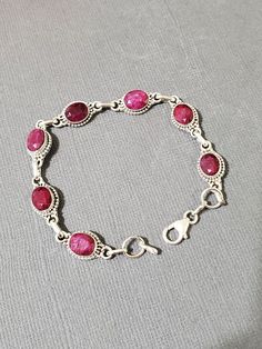 *7 1/4 Inches Ruby link bracelet  *Sterling Silver  *Free Shipping  *Handcrafted  *Jewelry ship in Gift box  All components are solid .925 silver.  Thank You For Your Looking ,And Check Out More Items In My Etsy Shop For More Great Deals, Also We Add More Jewelry To Etsy Shop regularly  www.etsy.com/shop/Silverlizzard  PLEASE check their dimensions, before setting the order.  NOTE -Once the parcel gets shipped out, it is usually needed 3-6 business days for every where in US Please keep in mind Oval Sterling Silver Bracelet For Anniversary, Engraved Oval Silver Bracelets, Sterling Silver 925 Stamped Bracelets For Anniversary, Oval Sterling Silver Bracelet With Clasp, Sterling Silver Spiritual Bracelet For Anniversary, Spiritual Sterling Silver Bracelet For Anniversary, Engraved Oval Sterling Silver Bracelets, Engraved Sterling Silver Oval Bracelet, Engraved Oval Sterling Silver Bracelet