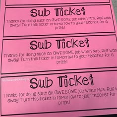 three pink tickets with the words sub ticket written in black and white on them, sitting next to each other