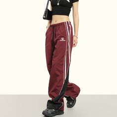 5ft 5''(166cm) tall, 97 lbs(44kg) weight and wearing a size M163cm/44kg wearing a size S - STRIPED- Nylon - Track sport style- Wide straight fit- 2 colors Functional Full Length Cargo Pants For Sports, Functional Full-length Cargo Pants For Sports, Full Length Sportswear Bottoms For Training, Sporty Baggy Bottoms For Outdoor Activities, Sporty Baggy Sweatpants For Outdoor Activities, Athleisure Full-length Pants For Outdoor Activities, Athleisure Full Length Pants For Outdoor Activities, Sportswear Cargo Pants, Full-length Sportswear Pants For Streetwear