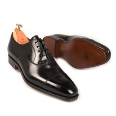 BLACK CORDOVAN OXFORD SHOES Classic Black Low-top Lace-up Shoes, Classic Black Formal Sneakers, Classic Black Oxfords With Branded Insole, Black Goodyear Welted Low-top Dress Shoes, Classic Low-top Oxfords With Rubber Heel Cap, Black Low-top Goodyear Welted Dress Shoes, Black Goodyear Welted Low-top Leather Shoes, Classic Black Sneakers With Brogue Detailing, Black Low-top Goodyear Welted Leather Shoes