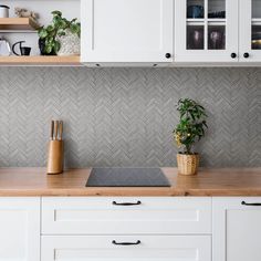 the kitchen counter is clean and ready to be used as an appliance for cooking