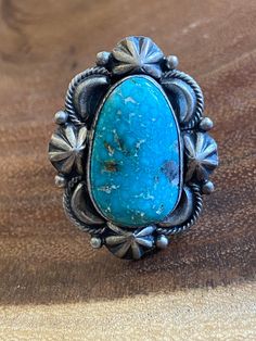 Navajo Kingman Turquoise Sterling Silver Ring Size 8. It measures 1 1/2 inches long and just over 1 inch wide. Signed by the artist and stamped sterling. Thank you for checking out my store, if you have any questions please contact me!! SKU:32090081886293_99207de* Southwestern Style Engraved Turquoise Ring As Gift, Engraved Southwestern Style Turquoise Ring For Gift, Collectible Engraved Turquoise Ring, Turquoise Concho Ring As Gift, Artisan Engraved Turquoise Ring Collectible, Turquoise Concho Ring For Gift, Turquoise Concho Ring As A Gift, Adjustable Engraved Turquoise Ring, Southwestern Style Turquoise Concho Ring As Gift