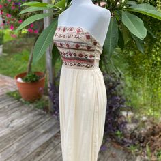 Smocked Back Beaded Front Maxi Gauze Long Skirt With Long Side Slits. Never Worn! Fitted Bohemian Smocked Top, Bohemian Strapless Dress With Smocked Back, Bohemian Smocked Top For The Beach, Fitted Sleeveless Bohemian Smocked Top, Bohemian Smocked Top For Vacation, Bohemian Beige Strapless Dress, Bohemian Sleeveless Smocked Top With Smocked Back, Beige Smocked Bodice Maxi Dress For Beach, Bohemian Sleeveless Smocked Top