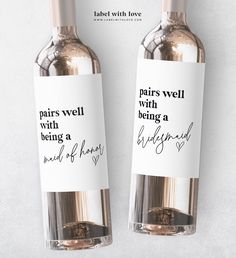 two bottles of wine with the words paris well and being a maid of heart written on them