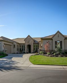 a large house with a driveway in front of it