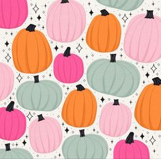 a pattern with pumpkins and stars on white background for wallpaper or fabric design