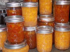 many jars filled with different kinds of food